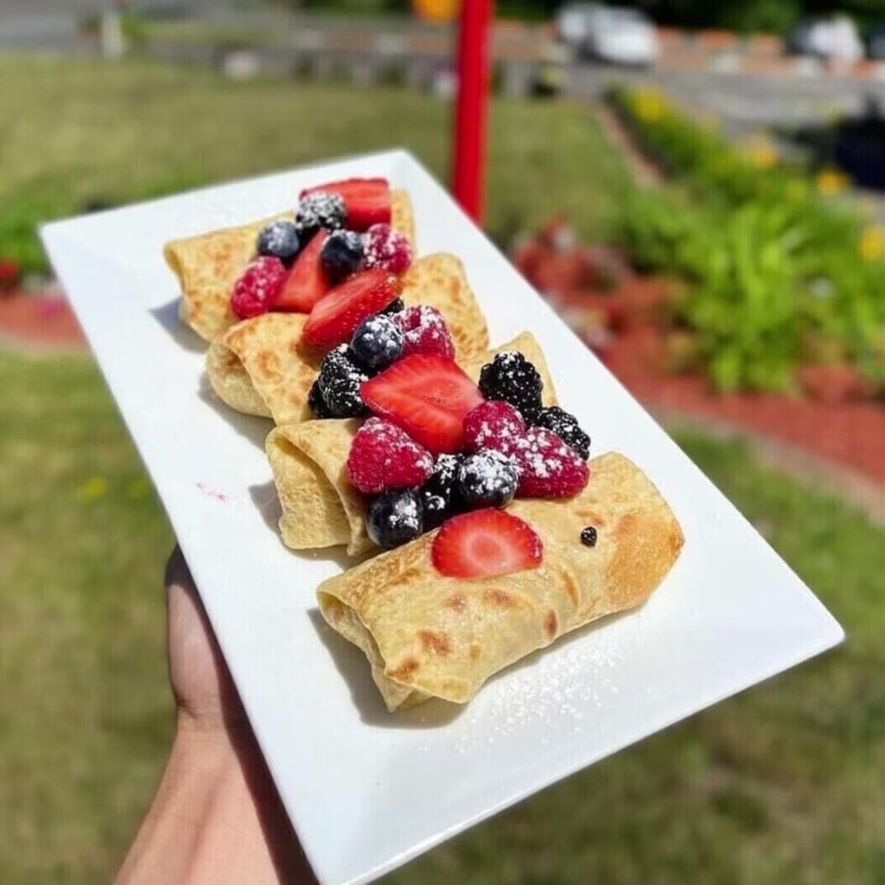 Sweet crepes with fresh berries